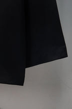 Black long-sleeve T-shirt sleeve hem with fine stitching detail