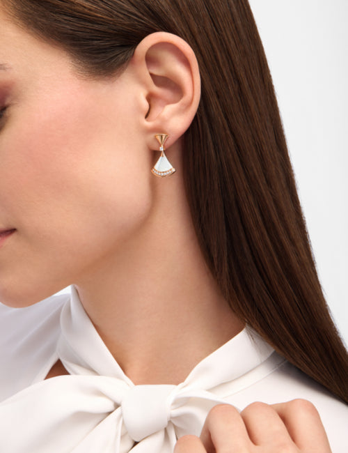 Rhinestone hoop earring with a small drop and fan-shaped white accent