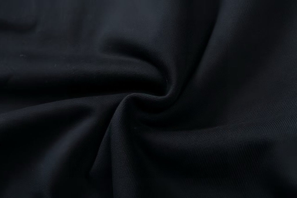 Dark sweatshirt knit fabric texture with soft drape