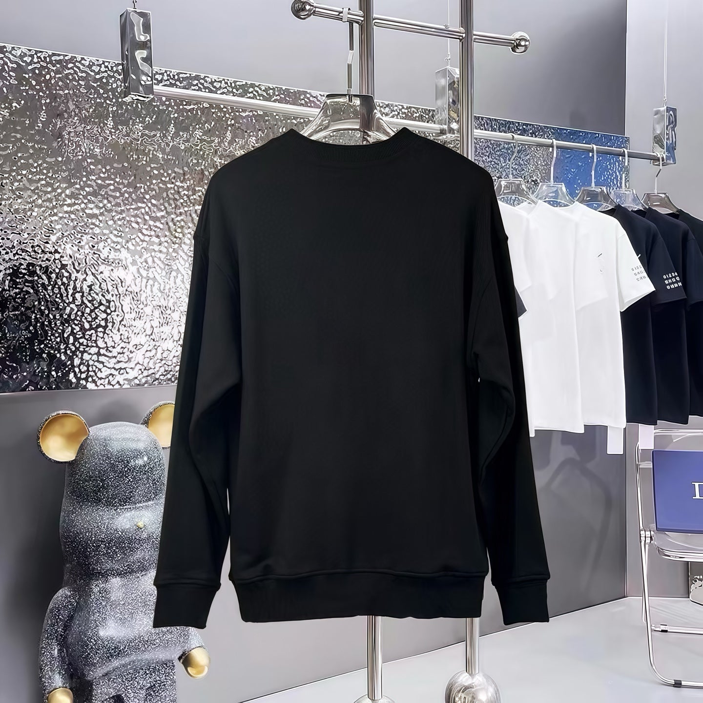 Black long-sleeve sweatshirt with crew neck, plain back