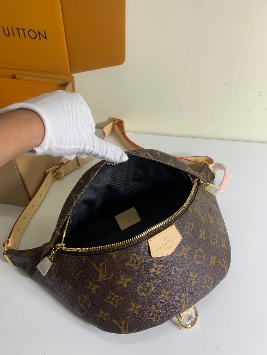 Louis Vuitton monogram hobo bag open top with black lining, gold zipper and label