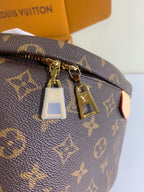 Louis Vuitton monogram bag top zipper with gold hardware and hanging tag, brown.