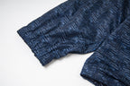 Navy jacket sleeves with elastic cuffs and geometric patterned fabric