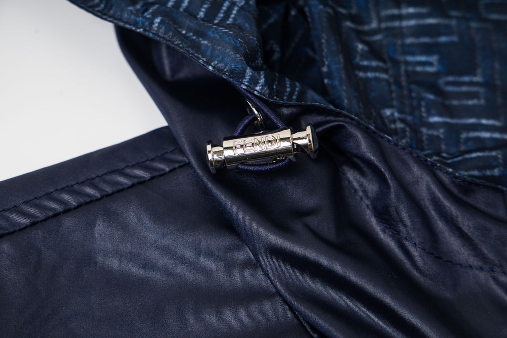 Navy jacket zipper and collar snap with metal pull tab