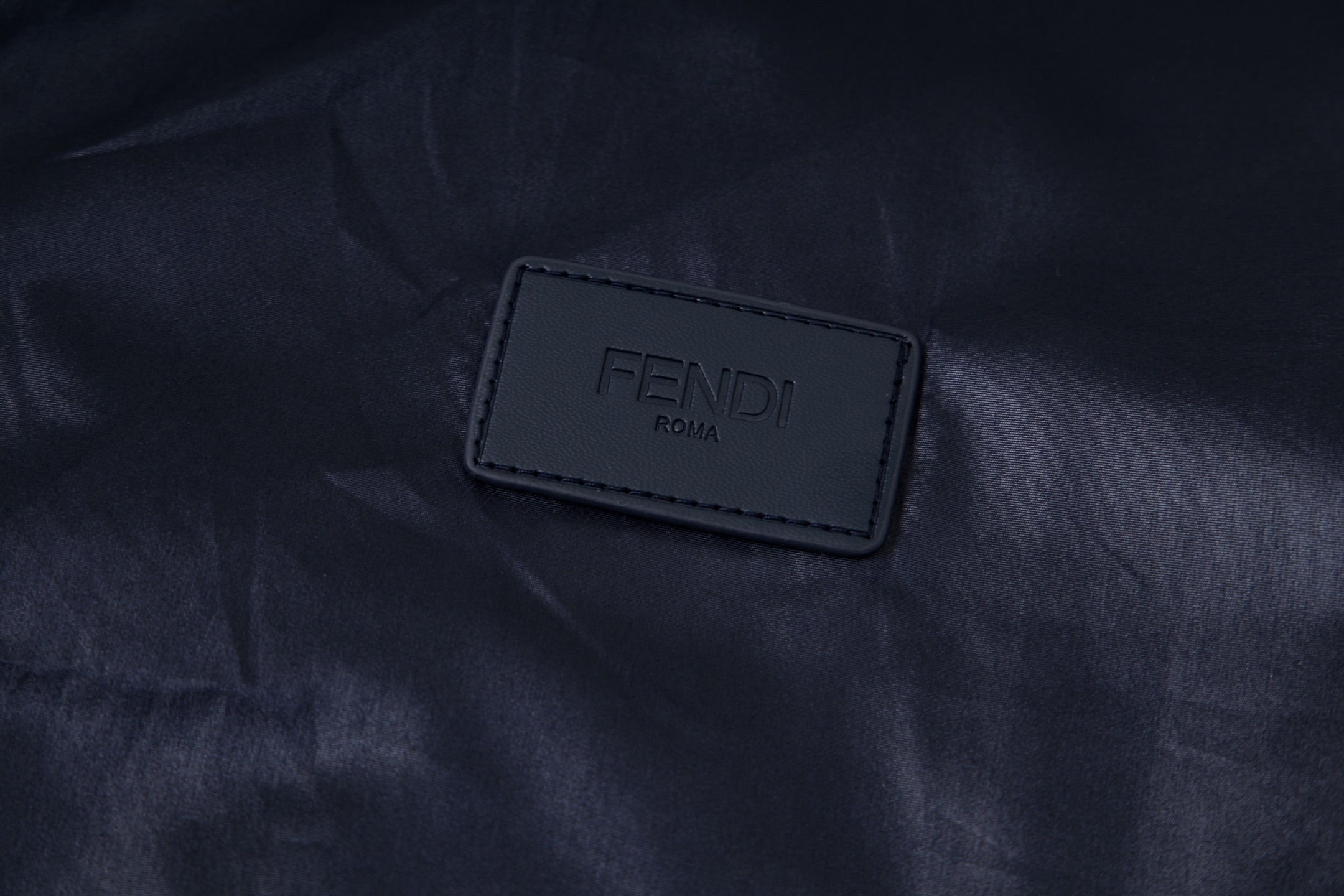 FENDI Roma logo patch on navy hooded jacket