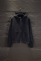 Balenciaga long zip-up hoodie, dark with hood, front zipper, and kangaroo pocket.