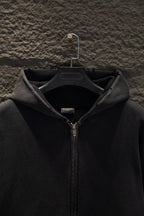 Balenciaga long zip-up hoodie hood with center front zipper; fabric texture detail.