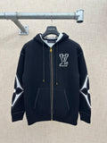 Zip-up hoodie with hood, dark knit, gold zipper, and LV-style chest logo patch
