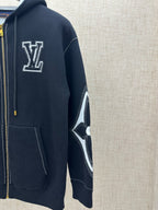 Side view zip-up hoodie with white LV-style logo and contrast diamond sleeve panel