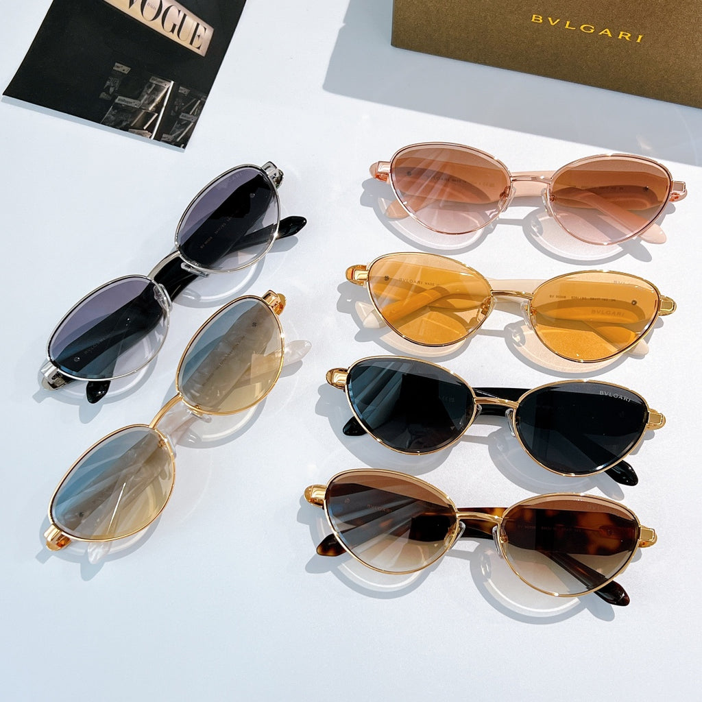 Assorted sunglasses with tinted lenses and colorful frames arranged in a set