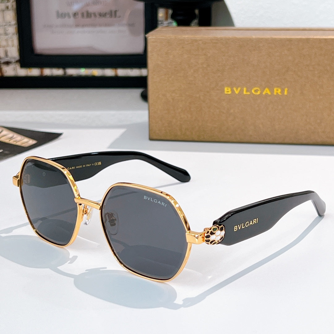 Gold-tone square sunglasses with dark gray lenses and black temple arms