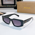 Bvlgari sunglasses, black frame side profile with gold logo detail