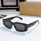 Bvlgari sunglasses, black cat-eye frame with dark-tinted lenses