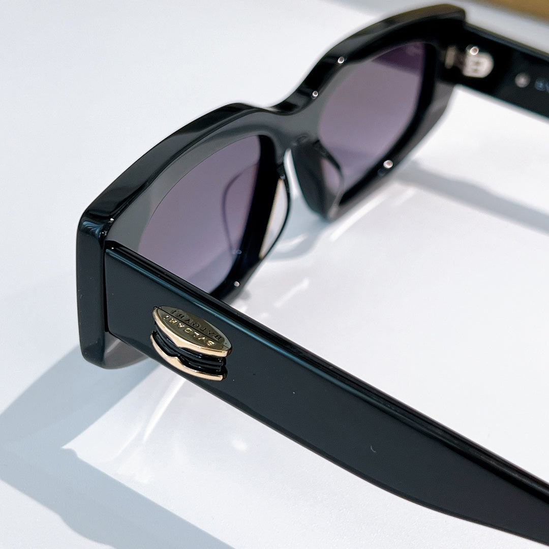 Bvlgari sunglasses, black frame with purple-tinted lenses, side view