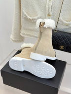 Chanel ladies beige suede ankle boots with treaded rubber outsole and side zipper