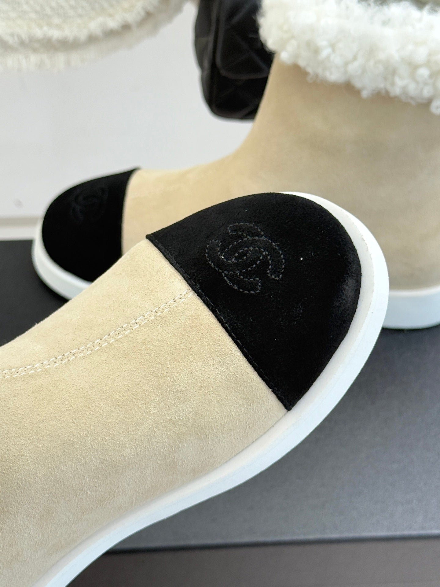 Chanel ladies beige suede slip-on ankle boot with black suede toe panel
