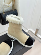 Chanel ladies beige suede slip-on ankle boots with white fuzzy cuff and white sole