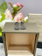 Pavé bell stud earrings set with two-tone sparkle, in silver finish