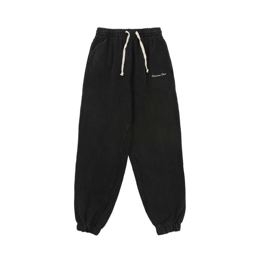 Black drawstring pants with elastic cuffs and Christian Dior logo