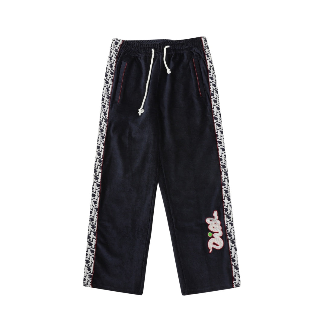 Navy drawstring pants with white drawcord and patterned logo side stripes