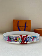 Louis Vuitton belt with white graphic strap and red LV buckle