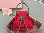 MiuMiu red mini bucket bag with adjustable shoulder straps and front flap