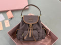 MiuMiu dark gray mini bag with flap, brown leather trim, gold-tone hardware
