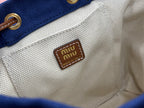 Miu Miu mini backpack beige interior label reading miu miu Made in Italy