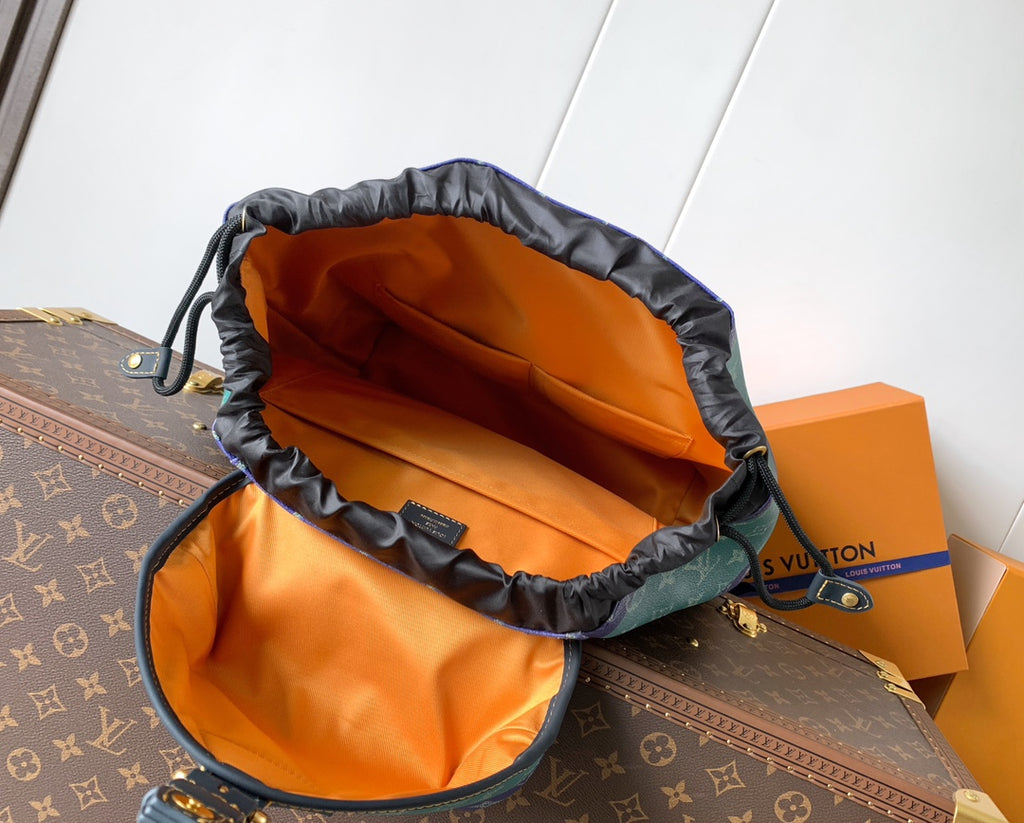Louis Vuitton backpack with open top, showing orange fabric lining