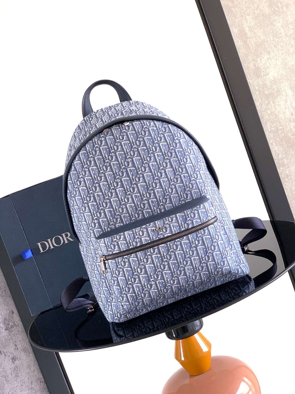 Dior men’s monogram backpack in light blue with navy trim and top handle