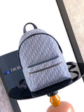 Dior men’s monogram backpack in light blue with navy trim and top handle