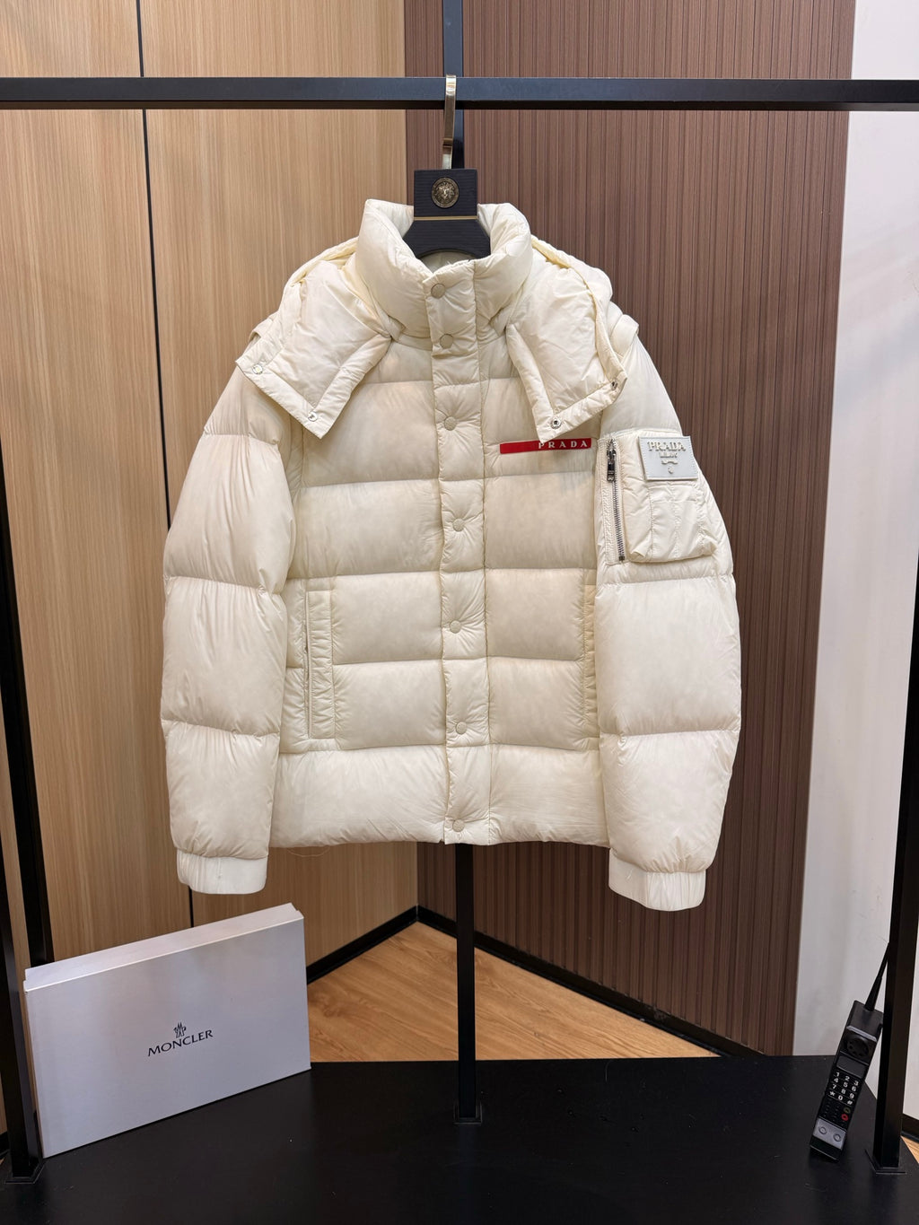 Prada long puffer jacket with hood and patch pocket, front zipper, cream