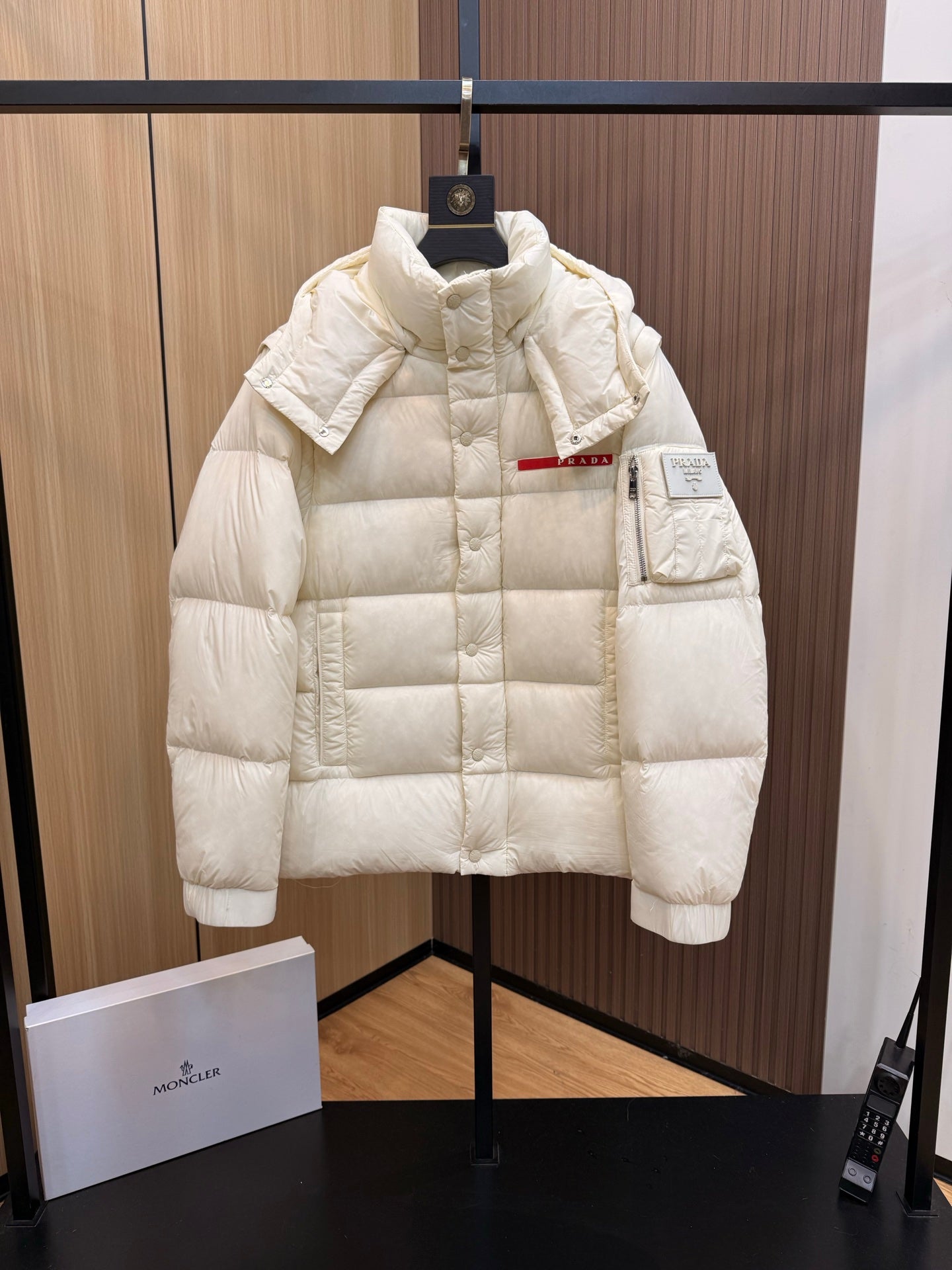 Prada long puffer jacket with hood and patch pocket, front zipper, cream