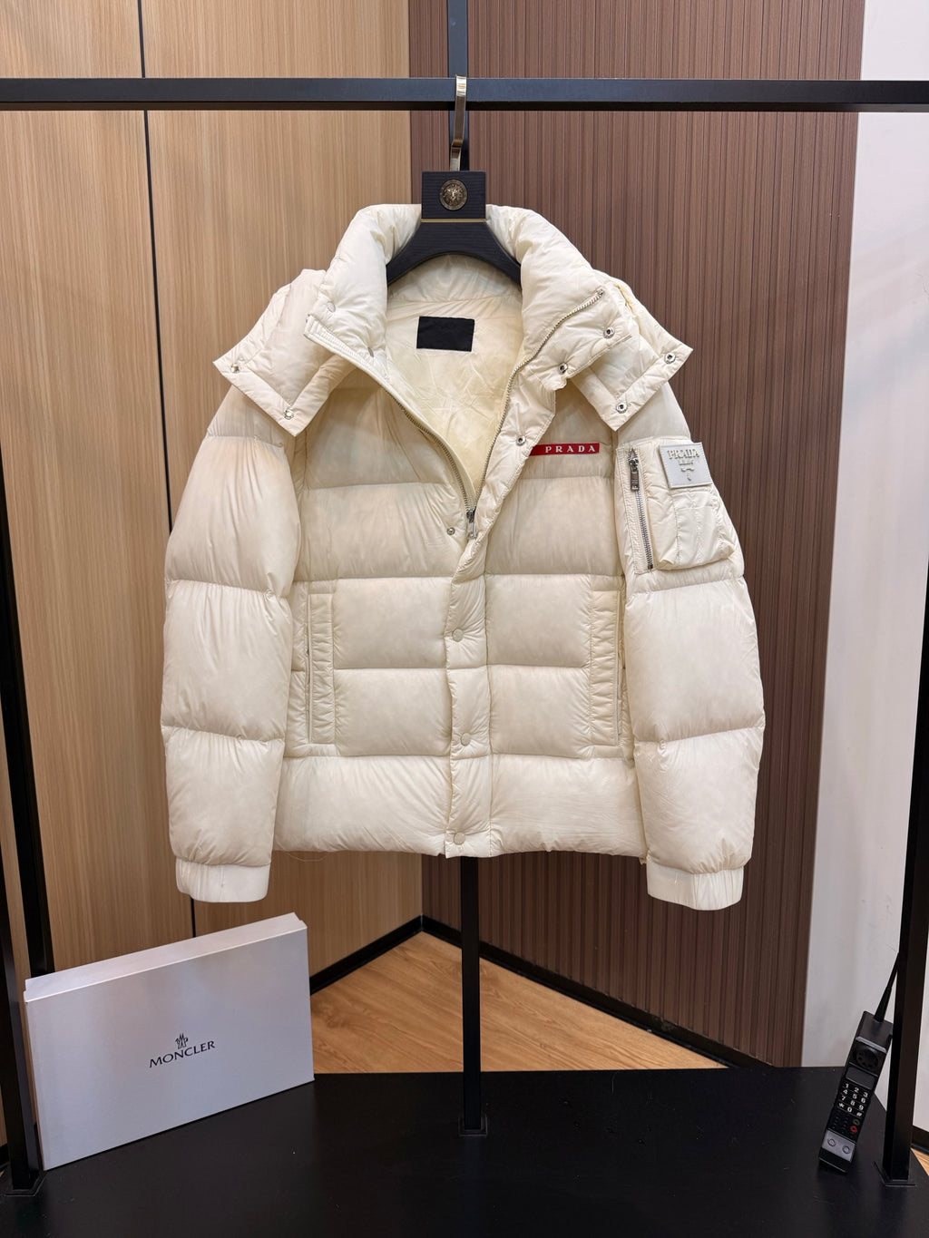 Prada long puffer jacket with hood, front zipper, logo patch, cream