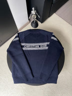 Dior long-sleeve sweater in dark navy with 'CHRISTIAN DIOR' logo stripe on the back
