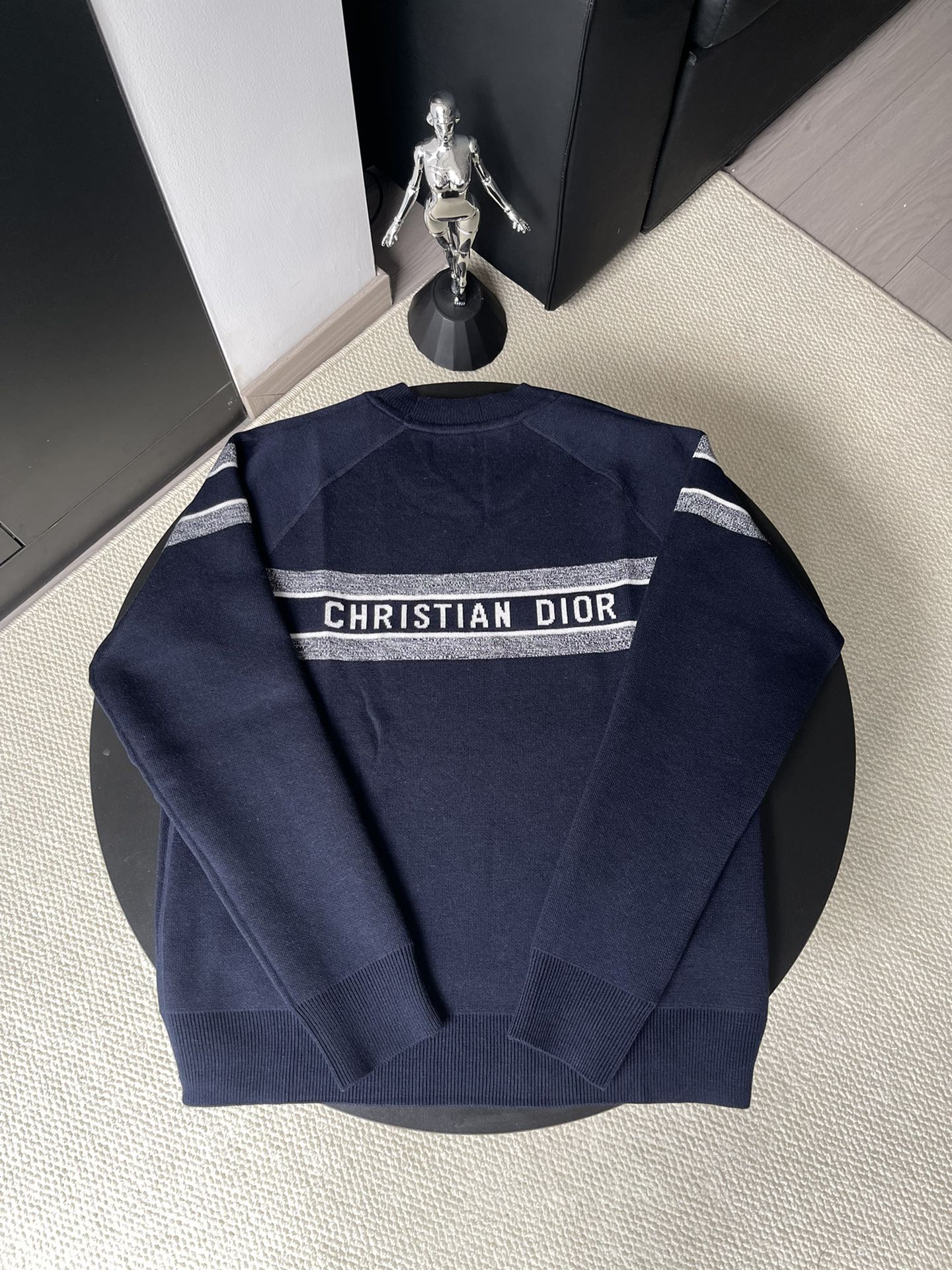 Dior long-sleeve sweater in dark navy with 'CHRISTIAN DIOR' logo stripe on the back