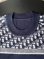 Dior long-sleeve sweater close-up of ribbed crew neck and knit texture
