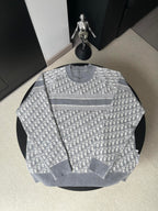 Gray long-sleeve crewneck sweater with allover monogram pattern