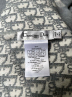 Interior clothing label: Christian Dior, size and fabric/care information