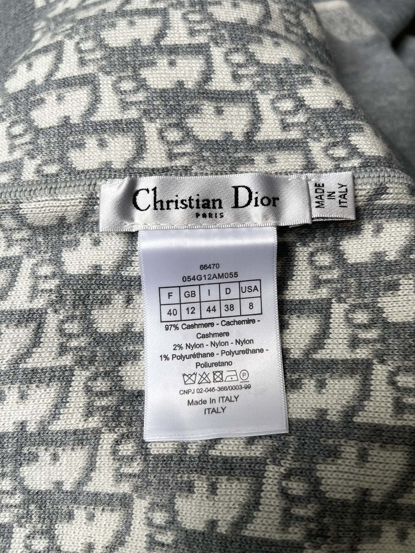 Interior clothing label: Christian Dior, size and fabric/care information