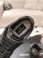 Black leather sneaker interior label and lace-up front