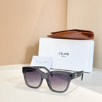Celine sunglasses with black frames and dark gray-tinted lenses