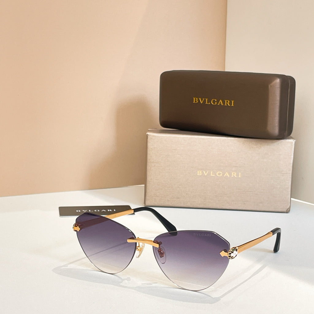 Bvlgari sunglasses with lavender tinted lenses, gold bridge and black temples.