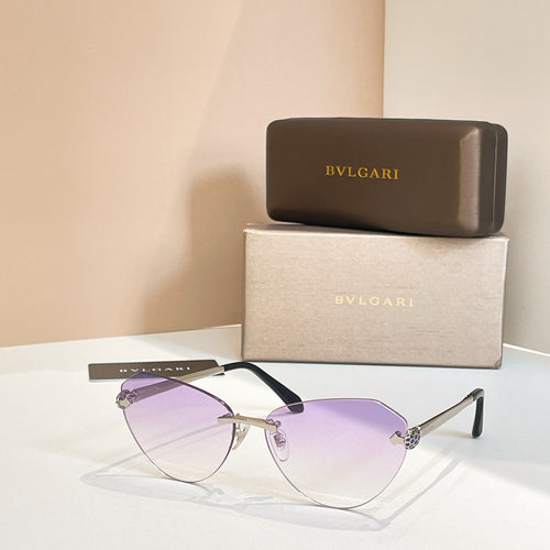 Bvlgari sunglasses with purple tinted lenses, black frame and gold accents.