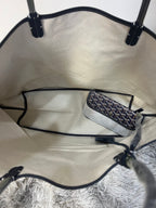 Goyard tote bag open view, interior lining, front zip pocket and handle straps