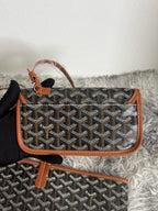Goyard patterned crossbody bag with flap, brown leather trim, dark monogram print