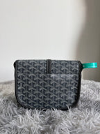 Crossbody bag with dark monogram fabric, front flap and adjustable strap