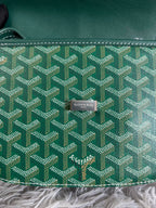 Green Goyard patterned canvas with centered logo patch and white contrast stitching