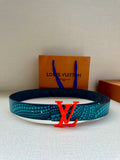 Blue patterned belt with red LV buckle, dark leather strap with embossed monogram.