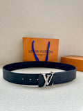 Navy Louis Vuitton embossed leather belt with silver-tone LV buckle and navy strap.